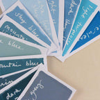 shades of blue Color swatches with text labels on a beige background